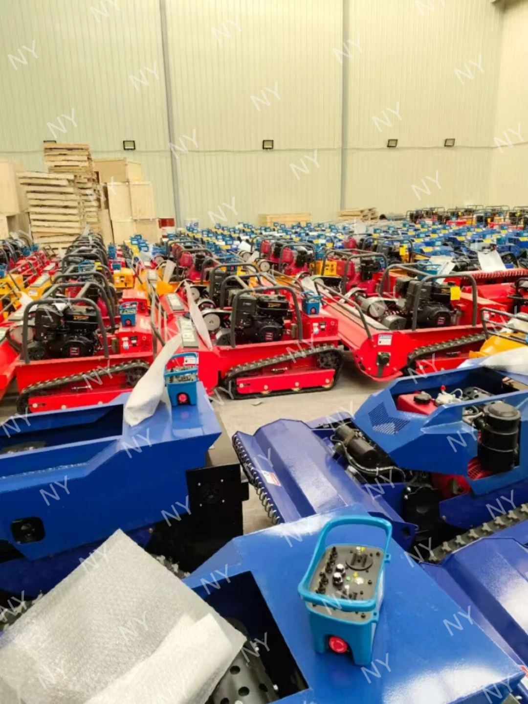 Rows of finished Nuoyu remote mowers prepared on factory floor