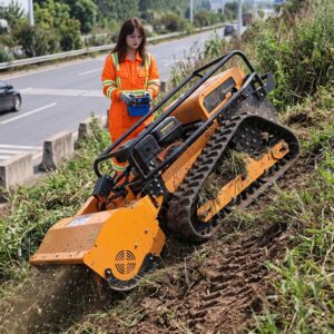 Tracked remote control mower providing traction on a slope
