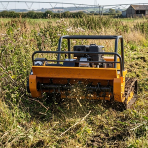 Remote control flail mower cutting grass weeds and brush